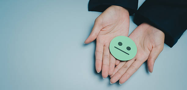 istock Neutral face emoji hands person emotion expression gesture isolated blue background human palm communication symbol sign feeling mood adult skin casual closeup one person holding isolated object 2249586486