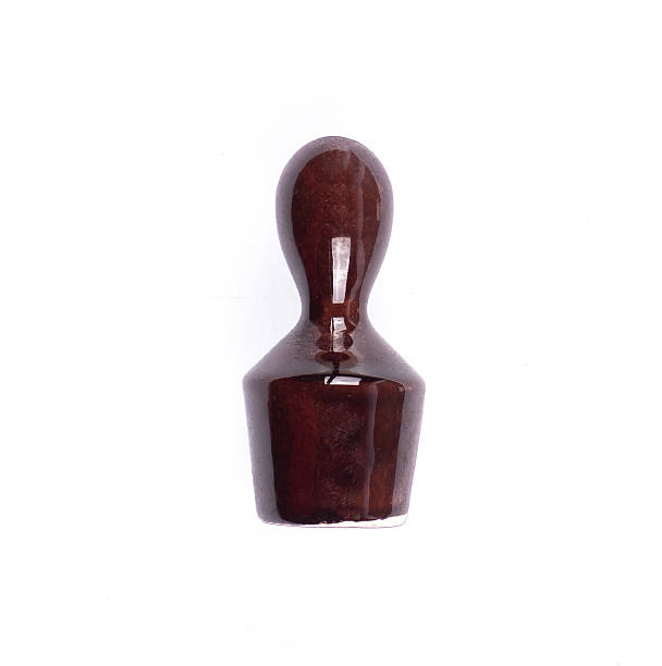 istock Shiny black chess pawn isolated on white background 2249587683