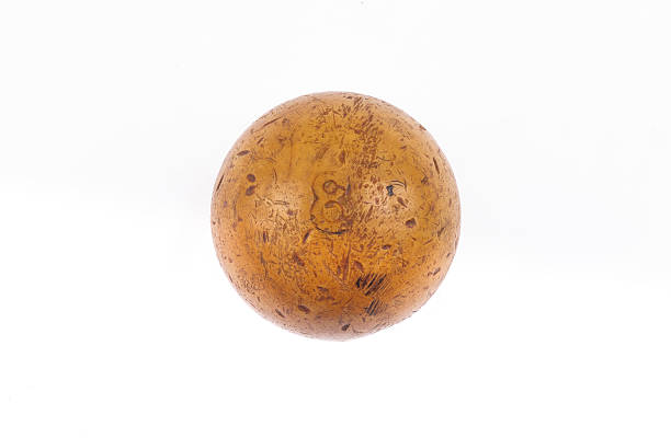Old brown billiard ball isolated on white background