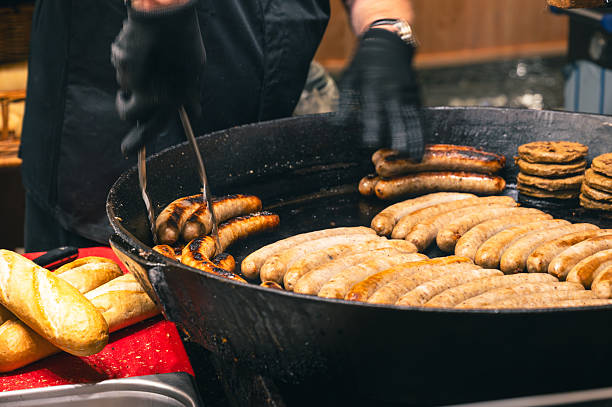 istock Grilled Sausage with Spices at Christmas Fair 2249590625