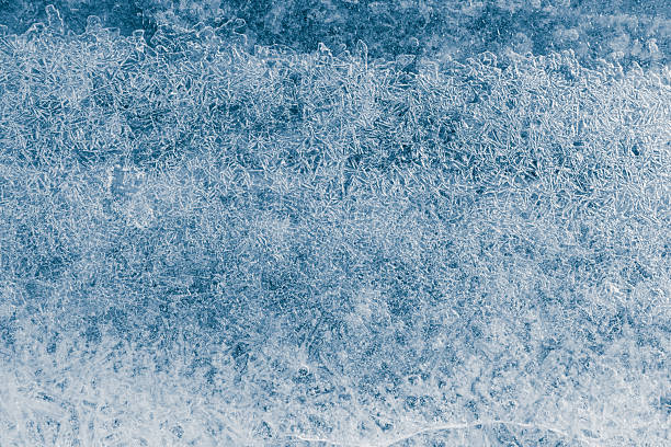 istock Ice texture crystal, blue tones background. Textured, cold, frosty surface of ice. 2249591394
