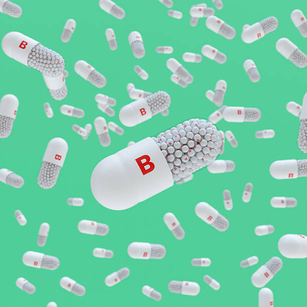 Close-up of a pill capsule with the label Vitamin B