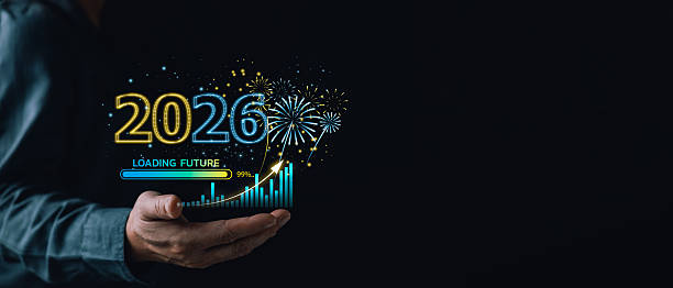 istock 2026 New Year celebration business growth concept. Hand holding virtual chart, fireworks, loading future bar. Financial success strategy and digital planning on dark background. 2249594654