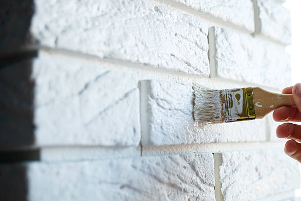istock painting plaster decorative brick with white paint 2249595777