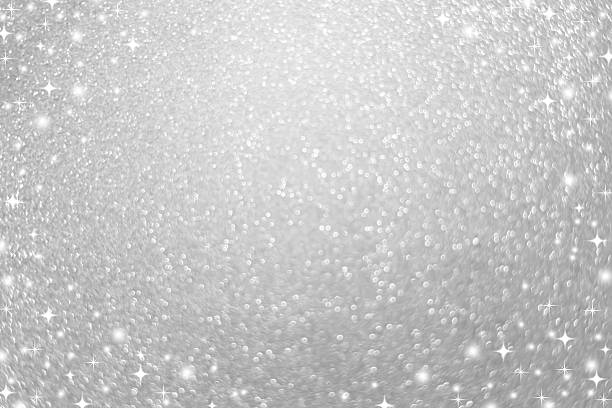 abstract blur beautiful glowing gold color background with circle bokeh light and shining star glittering for christmas festival and happy new year season design as banner concept