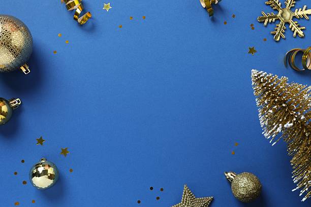 istock Blue festive Christmas background with golden decoration, copy space composition 2249606323