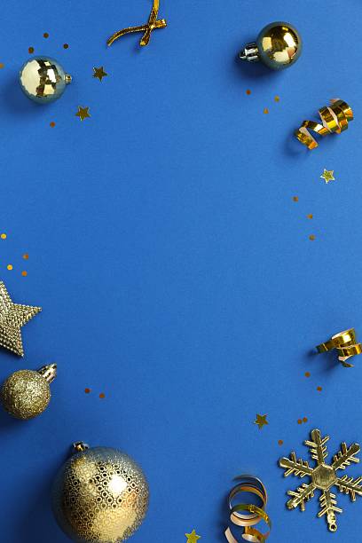 istock Blue festive Christmas background with golden decoration, copy space composition 2249606369
