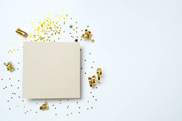 istock Festive background with paper card and confetti, copy space composition 2249609489
