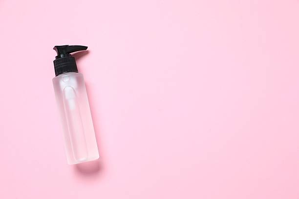 istock Cosmetic bottle on pink background 2249609499