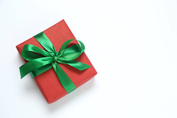 istock Beautiful gift box tied with bow on white background 2249609567