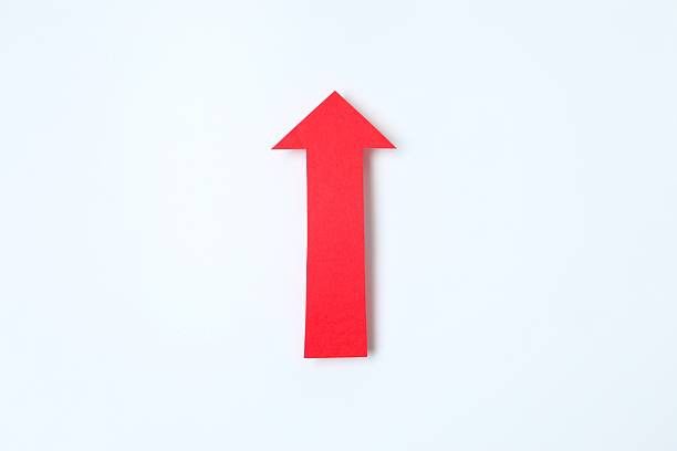 istock Paper arrow on color background, top view 2249609669