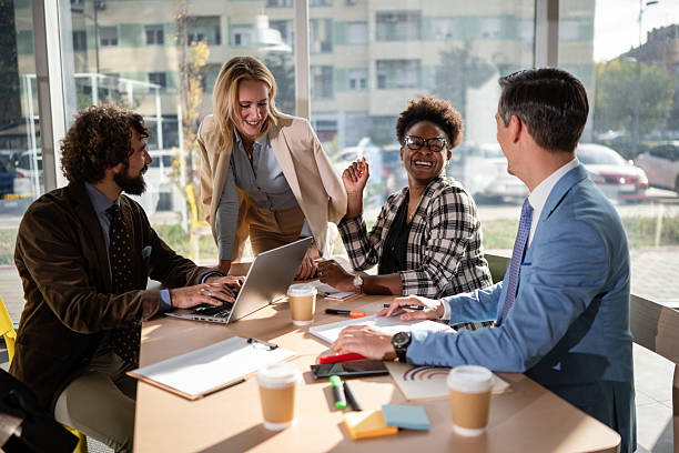 istock Diverse business team collaborating during a casual meeting 2249611251