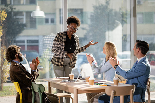istock Diverse business team applauding successful presentation in office 2249611340