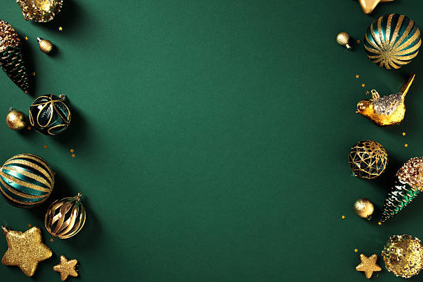 istock Christmas frame of art deco style decorations on dark green background. Flat lay, top view. 2249622892