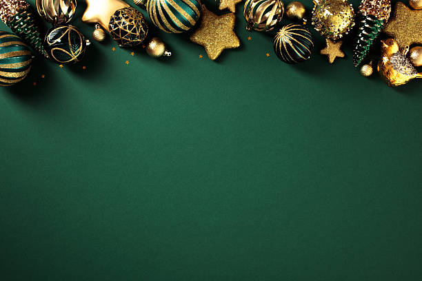 istock Art deco Christmas decorations top border on dark green background. Flat lay, top view. 2249622974