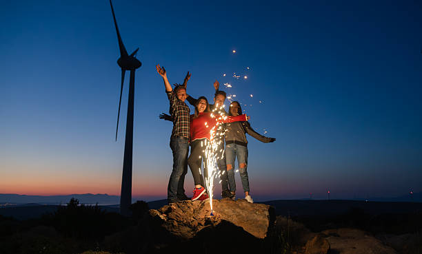 istock Best friends celebrating with sparklers at night 2249636208