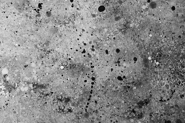 Unique abstract artwork created with ink splatters in black and white tones