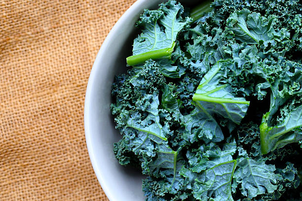 istock Curly kale leaves, Fresh green vegetables 2249640816