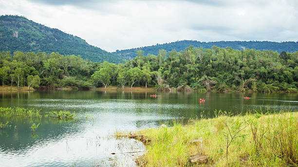 istock Mountain Lake with Lush Forest and Kayaks 2249643394