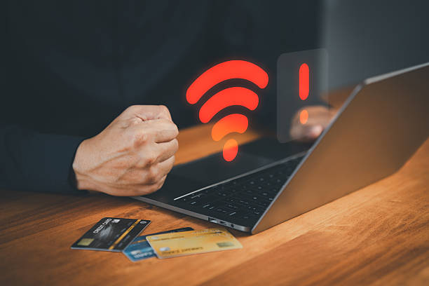 istock Male user using a laptop computer to connect to Wi-Fi, with clenched fist facing internet connectivity issue on laptop during online payment transaction, network failure, or technology disruption. 2249645591