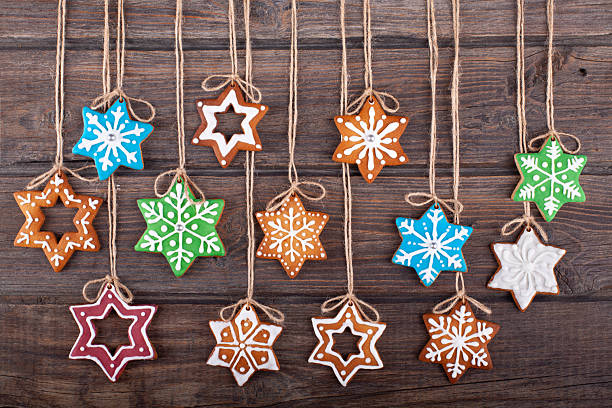 Christmas gingerbread cookies on wood rustic background