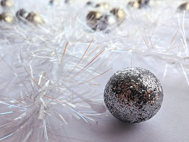 The silver Christmas ball on the white background