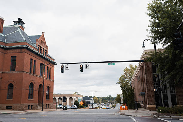 istock Historic brick buildings framing an urban street intersection 2249650159