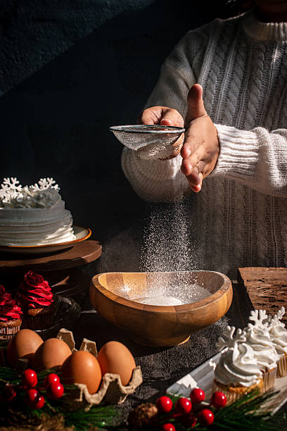 istock Christmas & New Year Baking Scene with Flour Sifting 2249660512