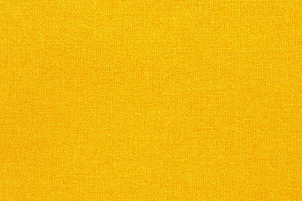 istock Yellow fabric cloth texture background, seamless pattern of natural textile. 2249661779