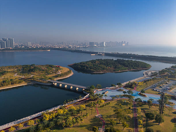 istock City Waterfront Park and Building Complex Landscape 2249664744