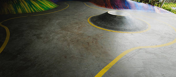 Skateboarder skateboarding at skatepark in city