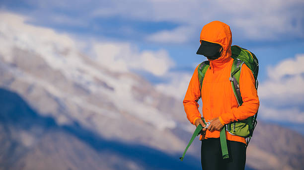 Woman hiking on high altitude mountain top
