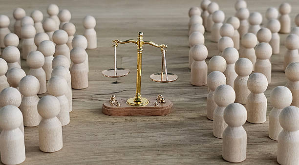 Two teams confronting each other on the scales. Rivalry between groups and leaders. The state and parties