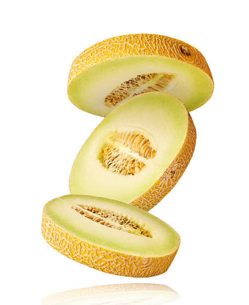 istock Fresh ripe Galia Melon falling in the air isolated on white background 2249681116