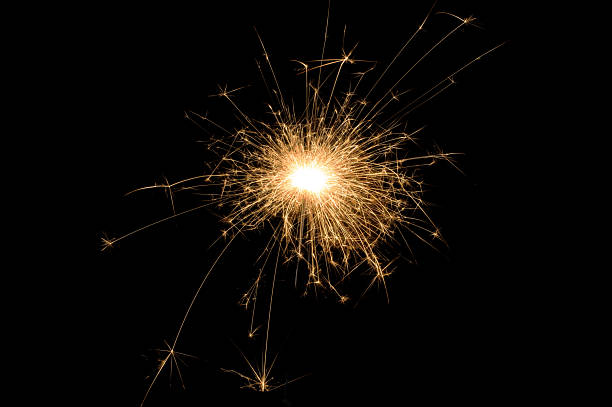 istock Golden Sparkler Burst on Black Background 2249685468
