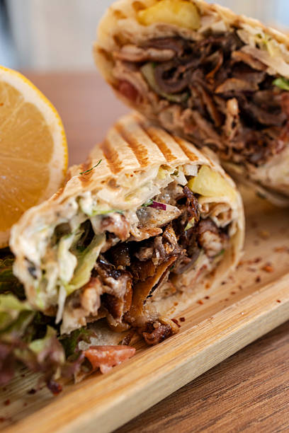 Delicious grilled chicken shawarma wrap with lemon