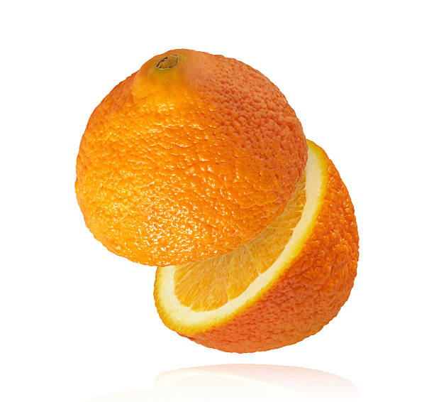 istock Fresh juicy orange slices floating on a white background. Creative citrus levitation concept for healthy food, summer vibes, advertising, packaging, and design projects. 2249686700