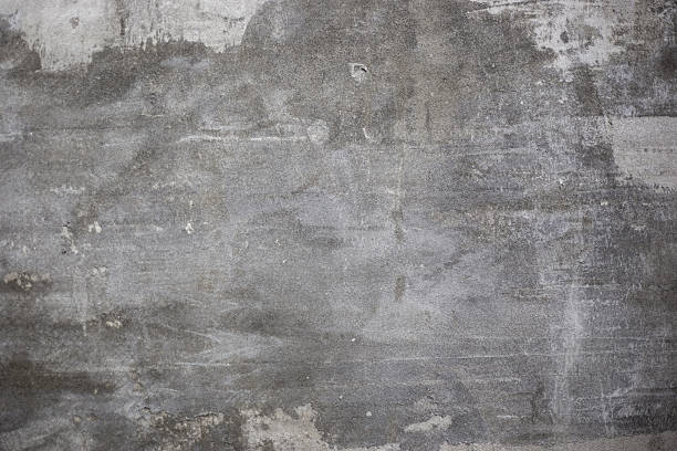 istock Dark gray concrete texture with noticeable rough areas and uneven, aged surfaces, grunge or industrial background 2249689196