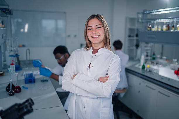 istock Female scientist standing confident with arms crossed in laboratory 2249698638