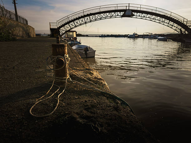 istock Mooring Bollard and Arched Bridge at Harbor 2249699742
