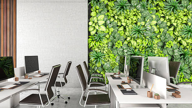 istock Modern Office Interior with Vertical Garden Wall and Desks 2249701843