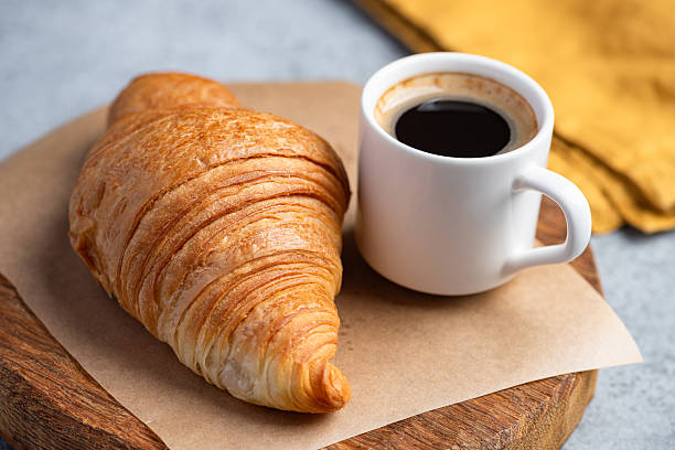 istock Croissant and espresso coffee 2249703980