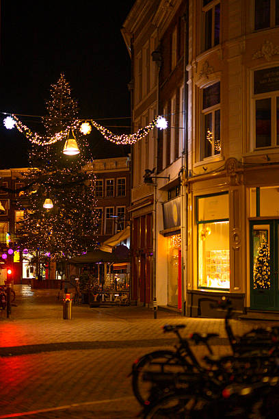 istock Christmas tree with old Dutch building facades at night 2249710443