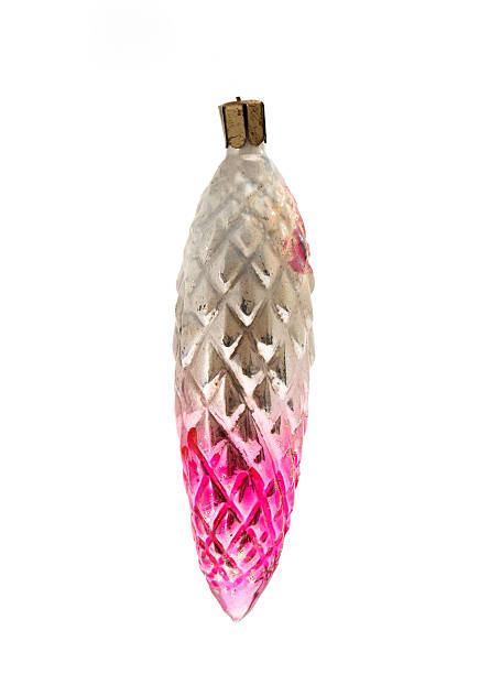 istock Vintage glass Christmas ornament shaped like a pine cone with silver and pink gradient, isolated on white background. 2249712077