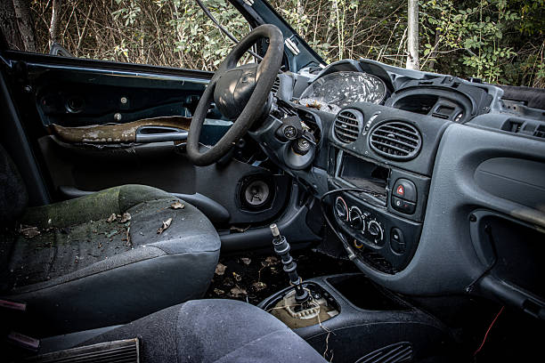 Interior of a damaged car parked in nature