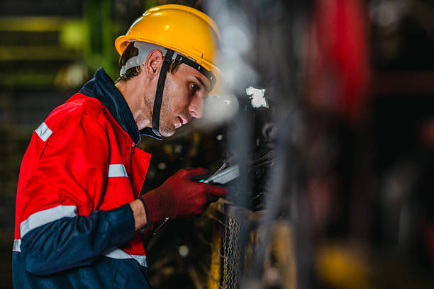 istock Technician Using Barcode Scanner and Tablet to Manage Auto Parts Inventory in Warehouse 2249716171