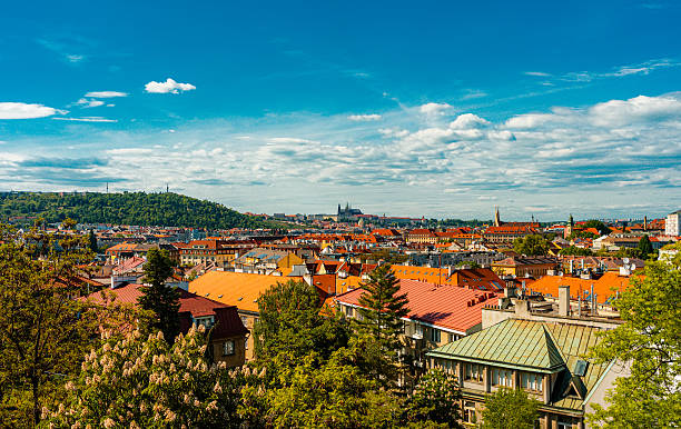 istock Panoramic view of Prague red roofs Castle and Vysehrad. 2249718442