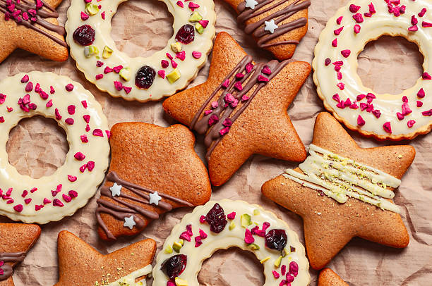 Festive gingerbread cookies with white chocolate icing and colorful toppings