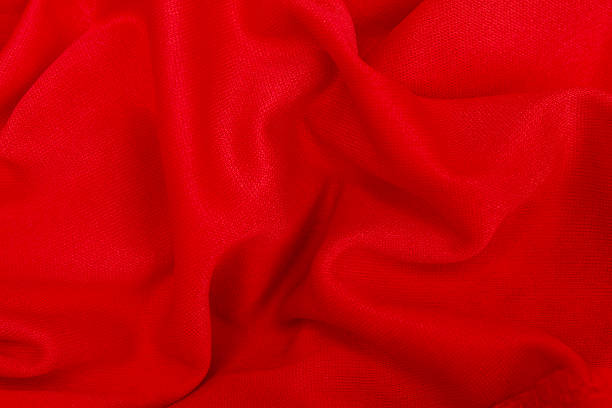 istock Close up of crumpled red cloth background 2249719518