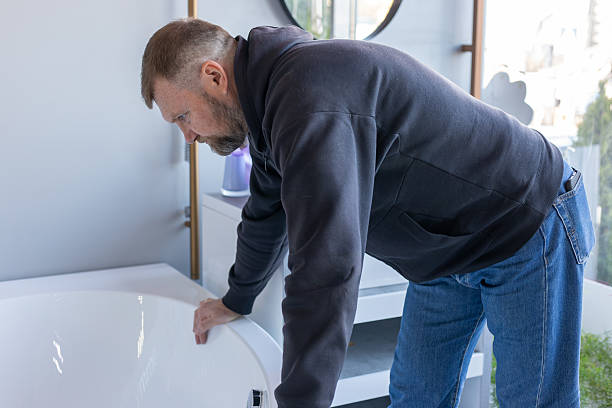 istock Man Choosing a Bathtub in a Plumbing Supply Store 2249722528